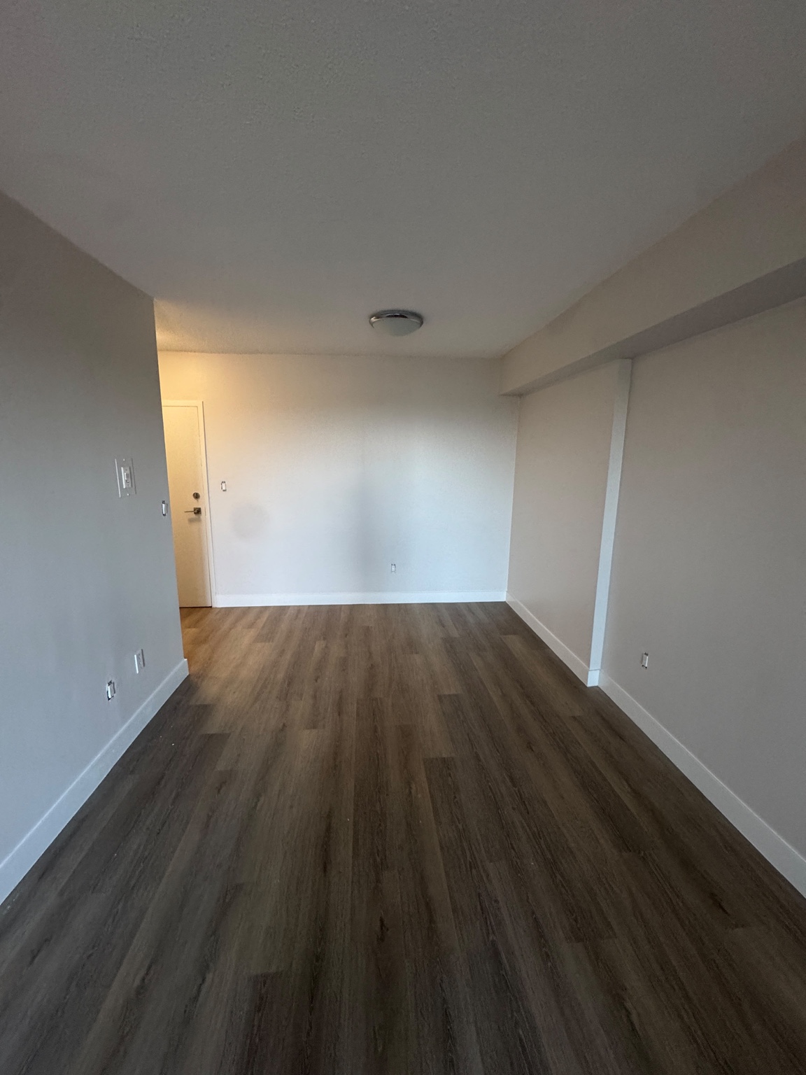Finished painted condo living and dining area
