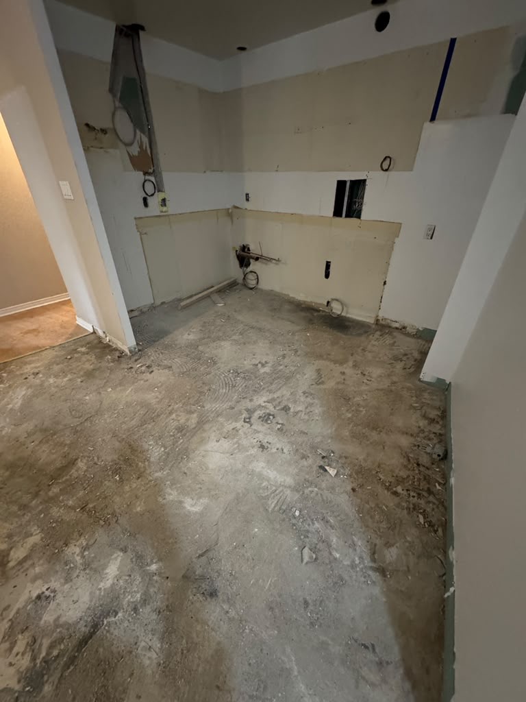Condo kitchen cleared during selective demolition